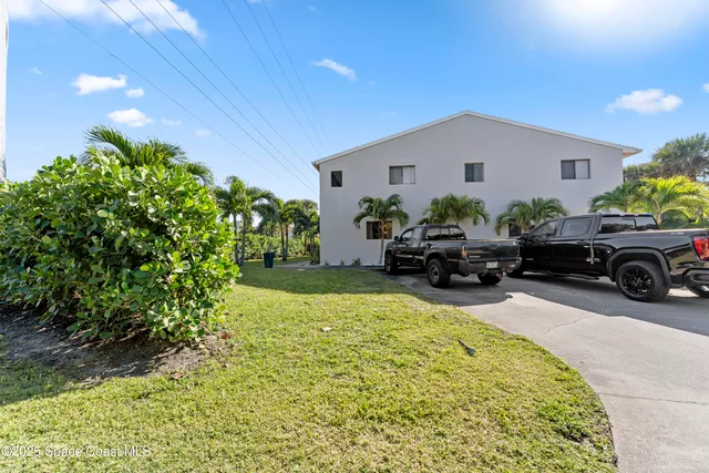 a view of balcony with furniture