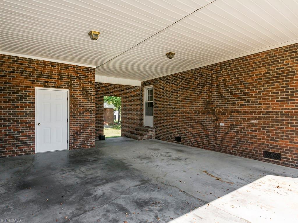 910 Trollinger Road Graham, NC 27253 - Photo 3 of 28 Two car carport with storage area