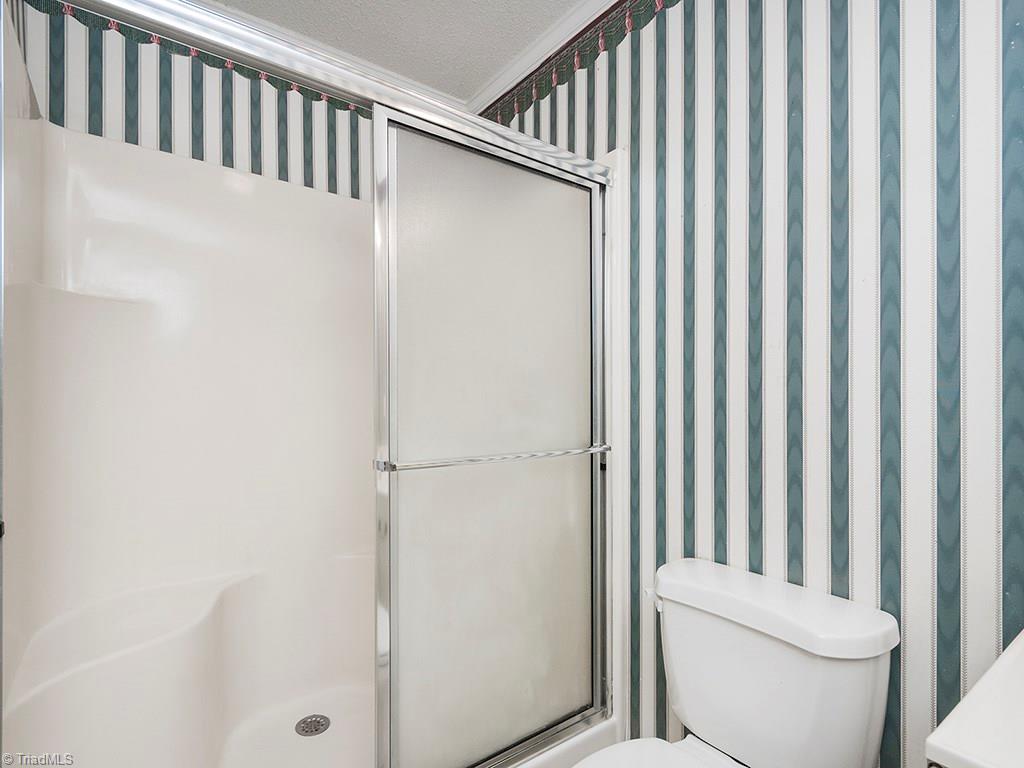 910 Trollinger Road Graham, NC 27253 - Photo 22 of 28 Master Bathroom with walk in shower