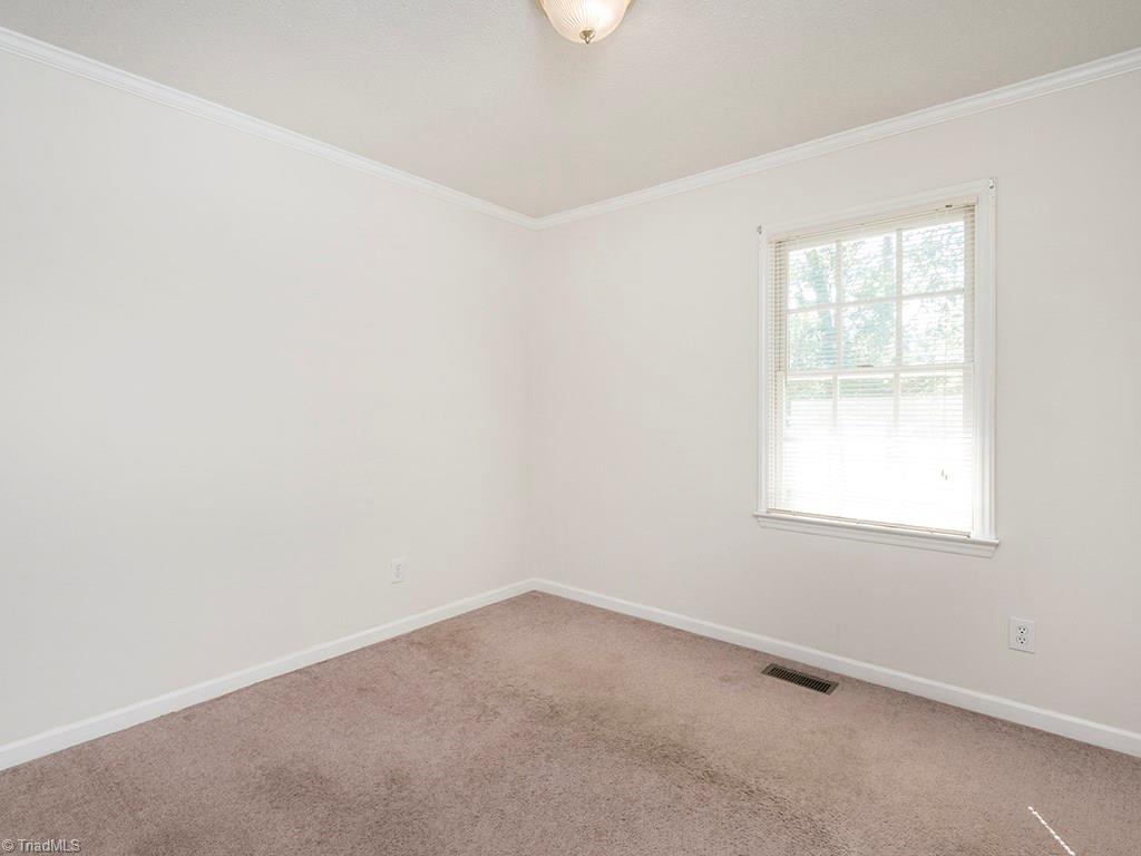 910 Trollinger Road Graham, NC 27253 - Photo 23 of 28 Second Bedroom