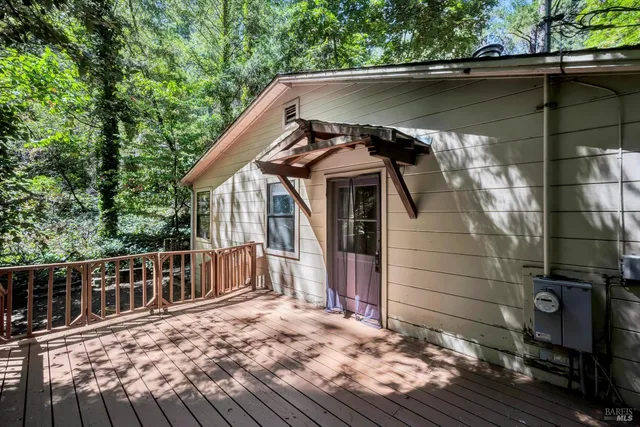 a house with trees in the background