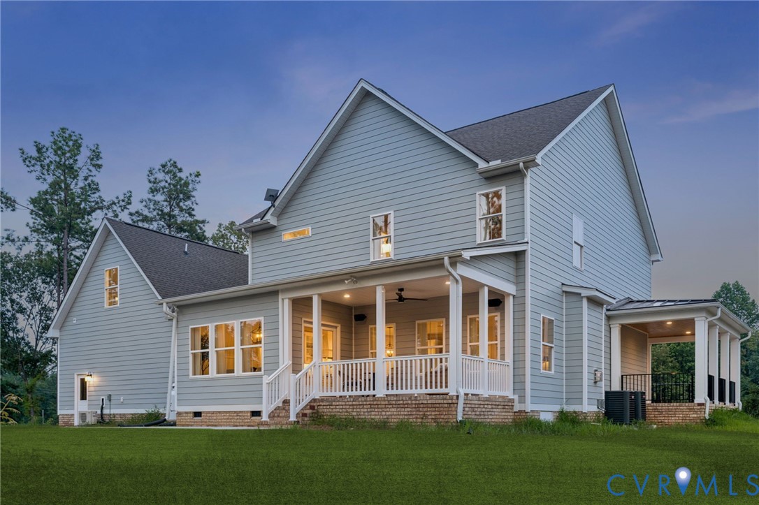 2 Winding Acres Lane New Kent, VA 23124 - Photo 3 of 31 front view of a house with a yard