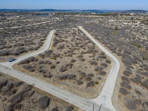 a view of a water heater and a floor view
