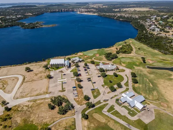 an aerial view of residential building and parking space