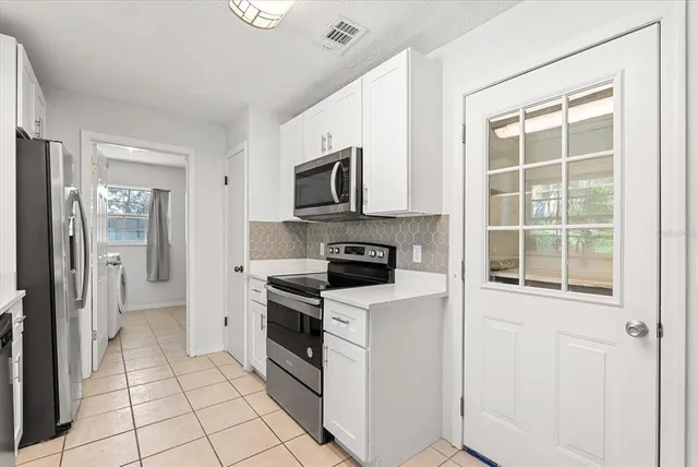 a room with furniture and wooden floor