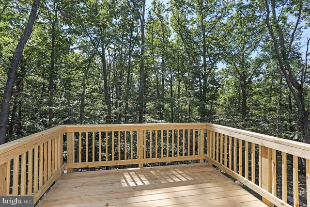 a view of a wooden roof deck