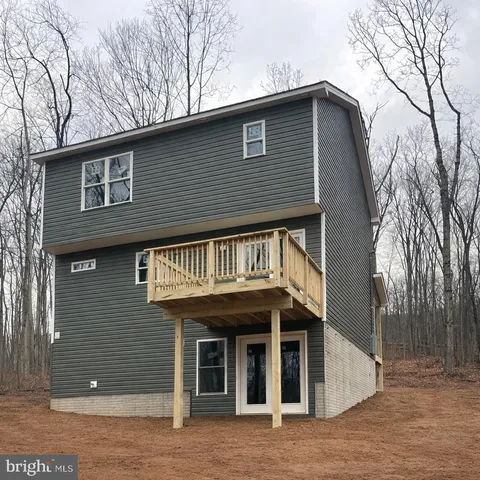 a front view of a house with glass windows