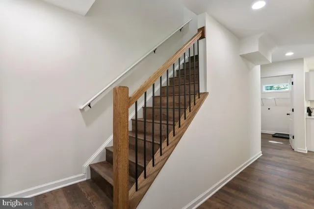 a view of entryway with wooden floor
