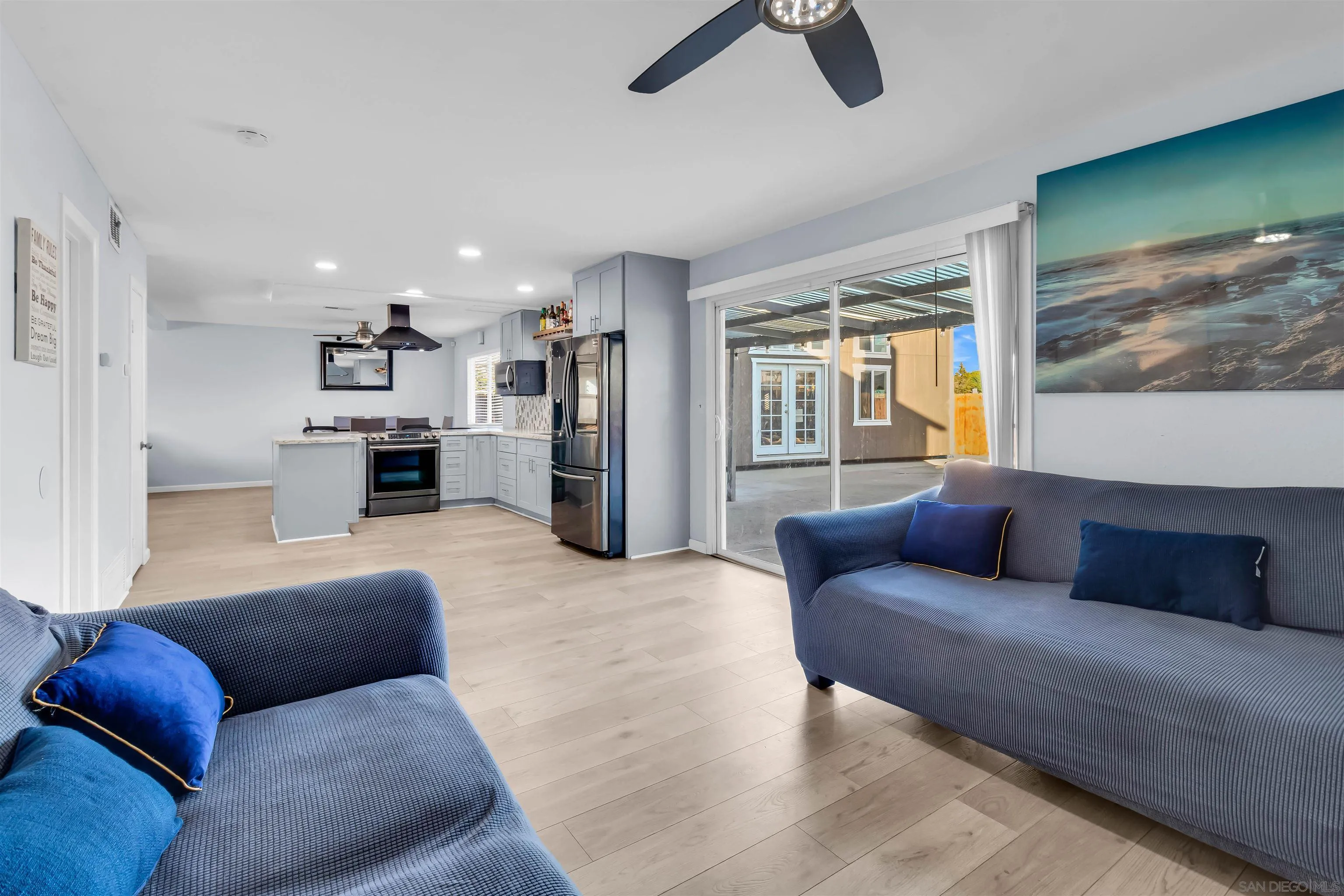 341 Paraiso Avenue Spring Valley, CA 91977 - Photo 15 of 35 a living room with furniture and a flat screen tv