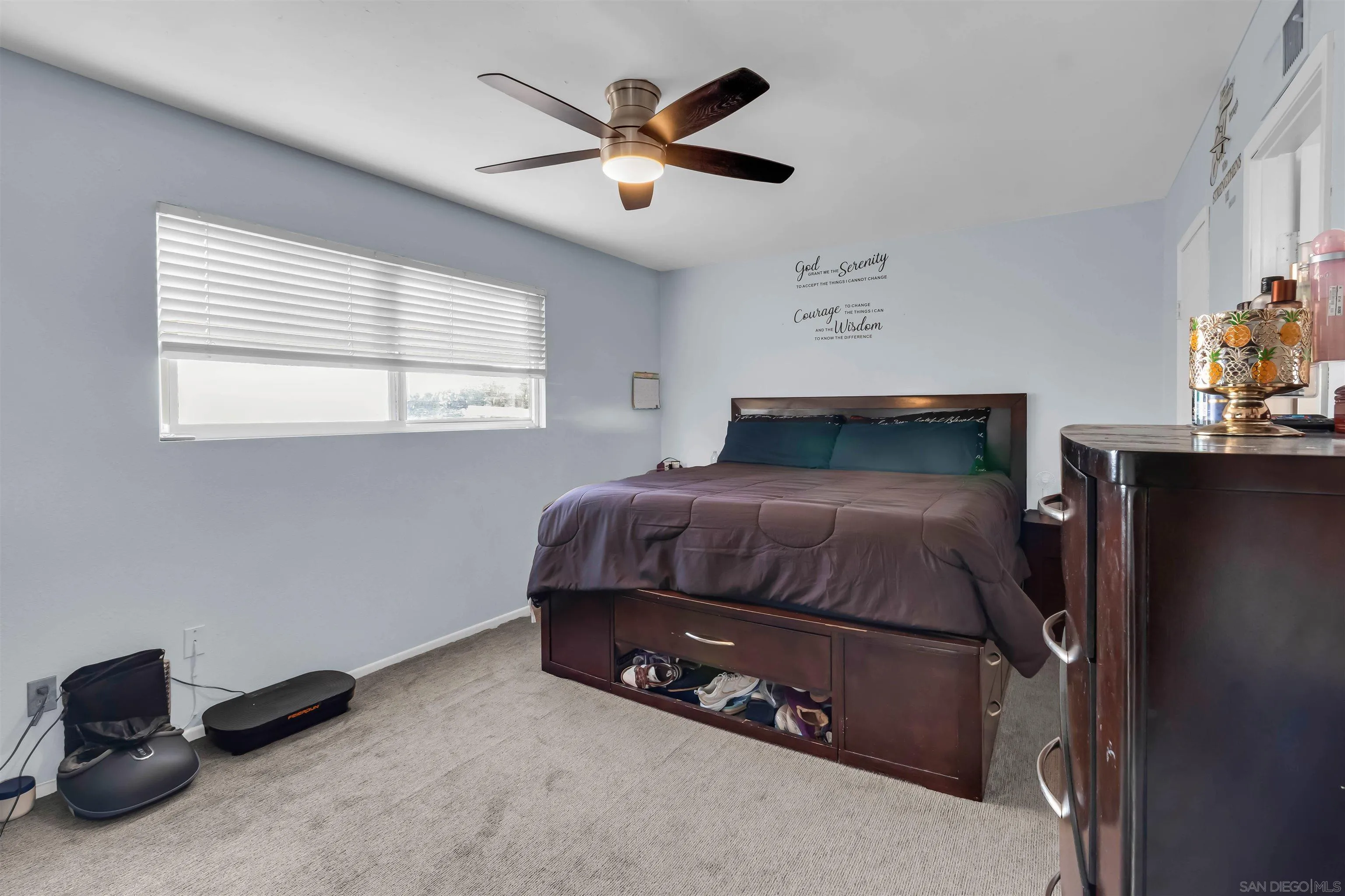 341 Paraiso Avenue Spring Valley, CA 91977 - Photo 23 of 35 a bedroom with a bed and a ceiling fan