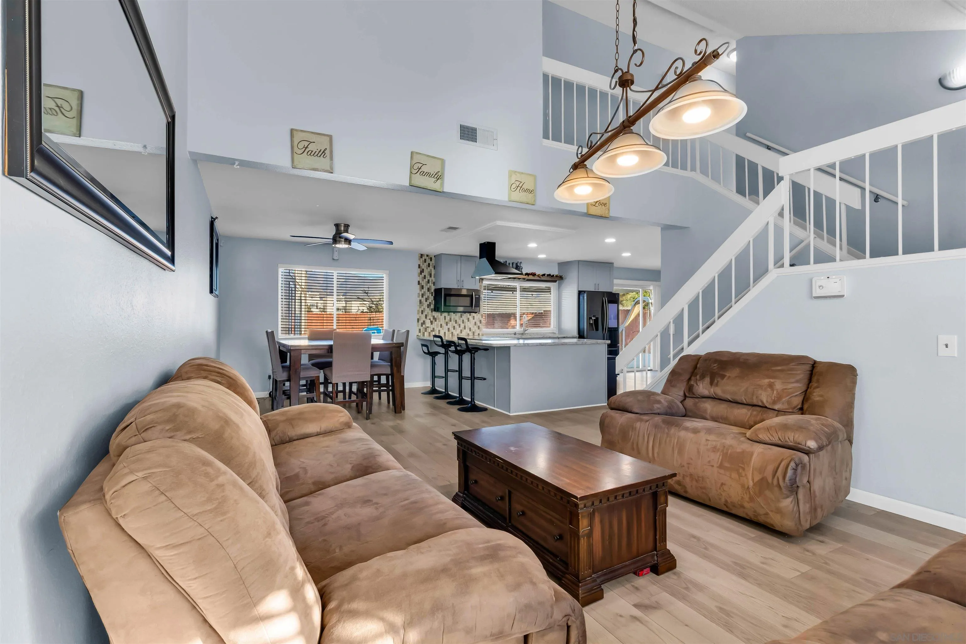 341 Paraiso Avenue Spring Valley, CA 91977 - Photo 3 of 35 a living room with furniture and wooden floor