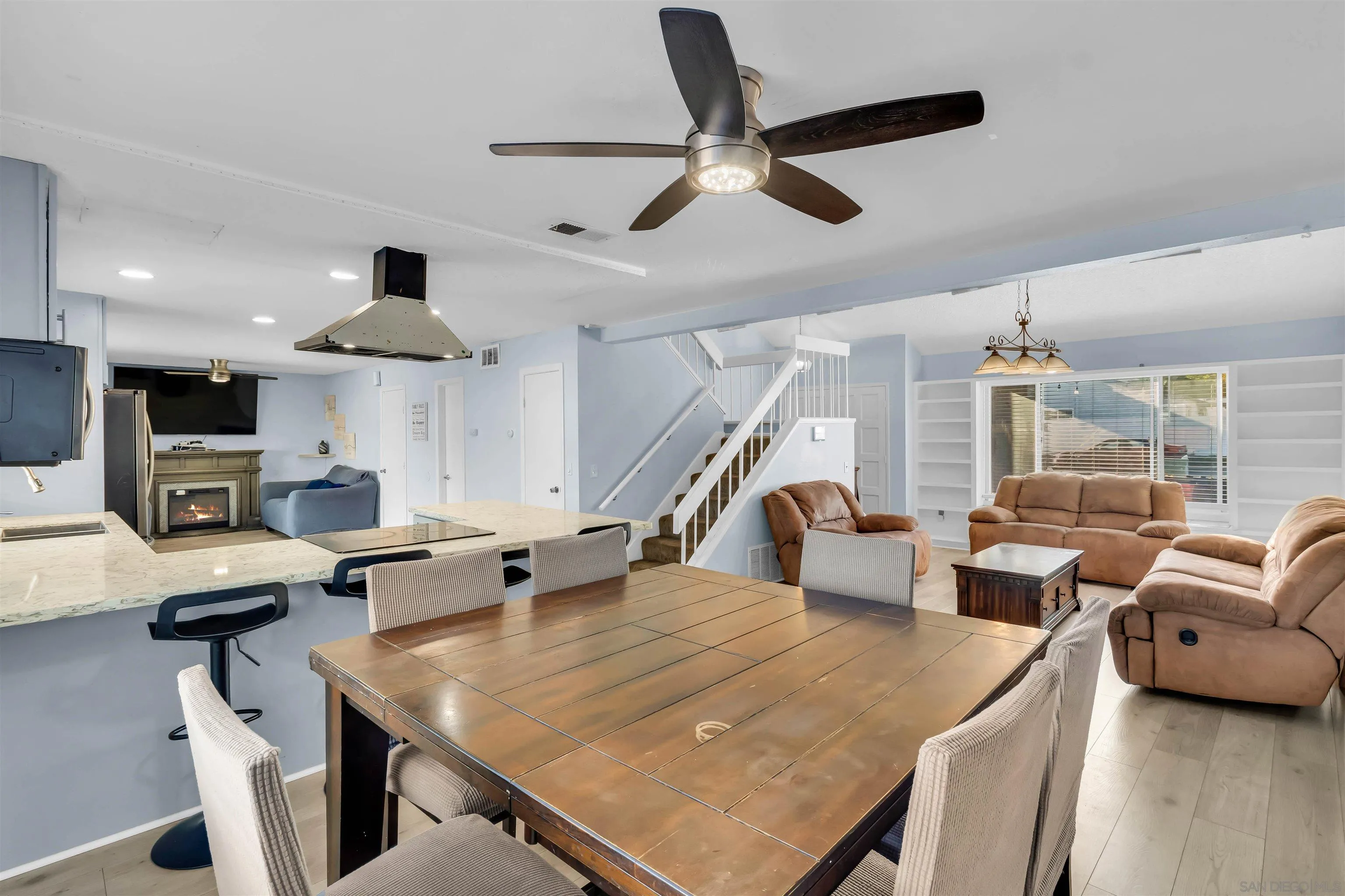 341 Paraiso Avenue Spring Valley, CA 91977 - Photo 7 of 35 a living room with furniture and a large window