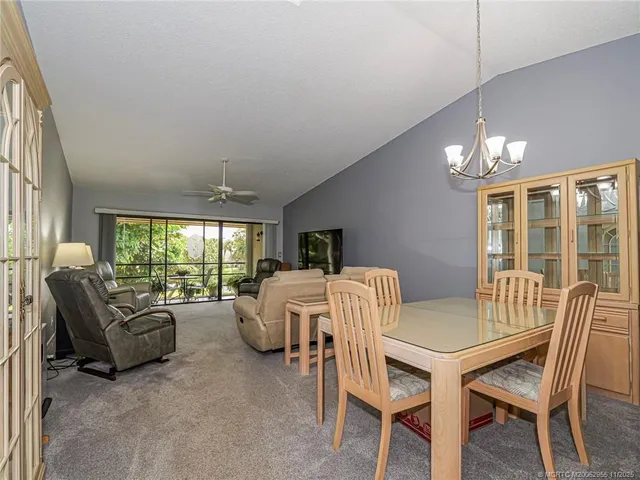 a view of a livingroom with furniture window and outside view