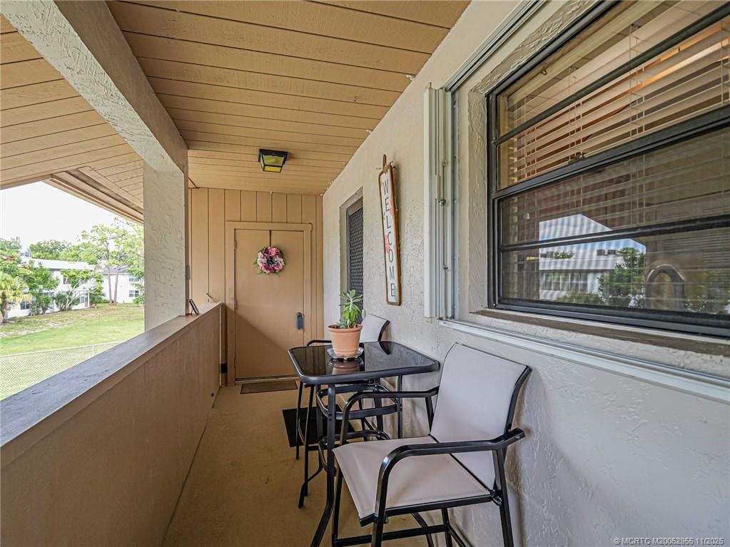 3001 Southeast Aster Lane, Unit 908 Stuart, FL 34994 - Photo 3 of 35 a outdoor space with furniture