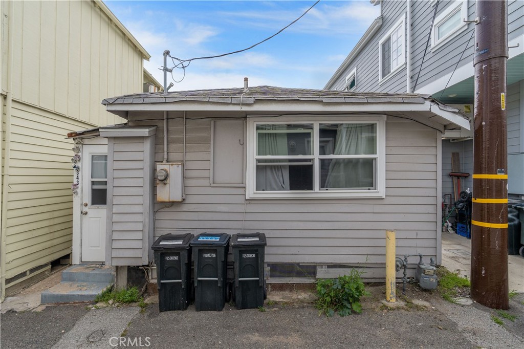343 Eucalyptus Avenue Avalon, CA 90704 - Photo 19 of 35 a view of a house with roof and windows