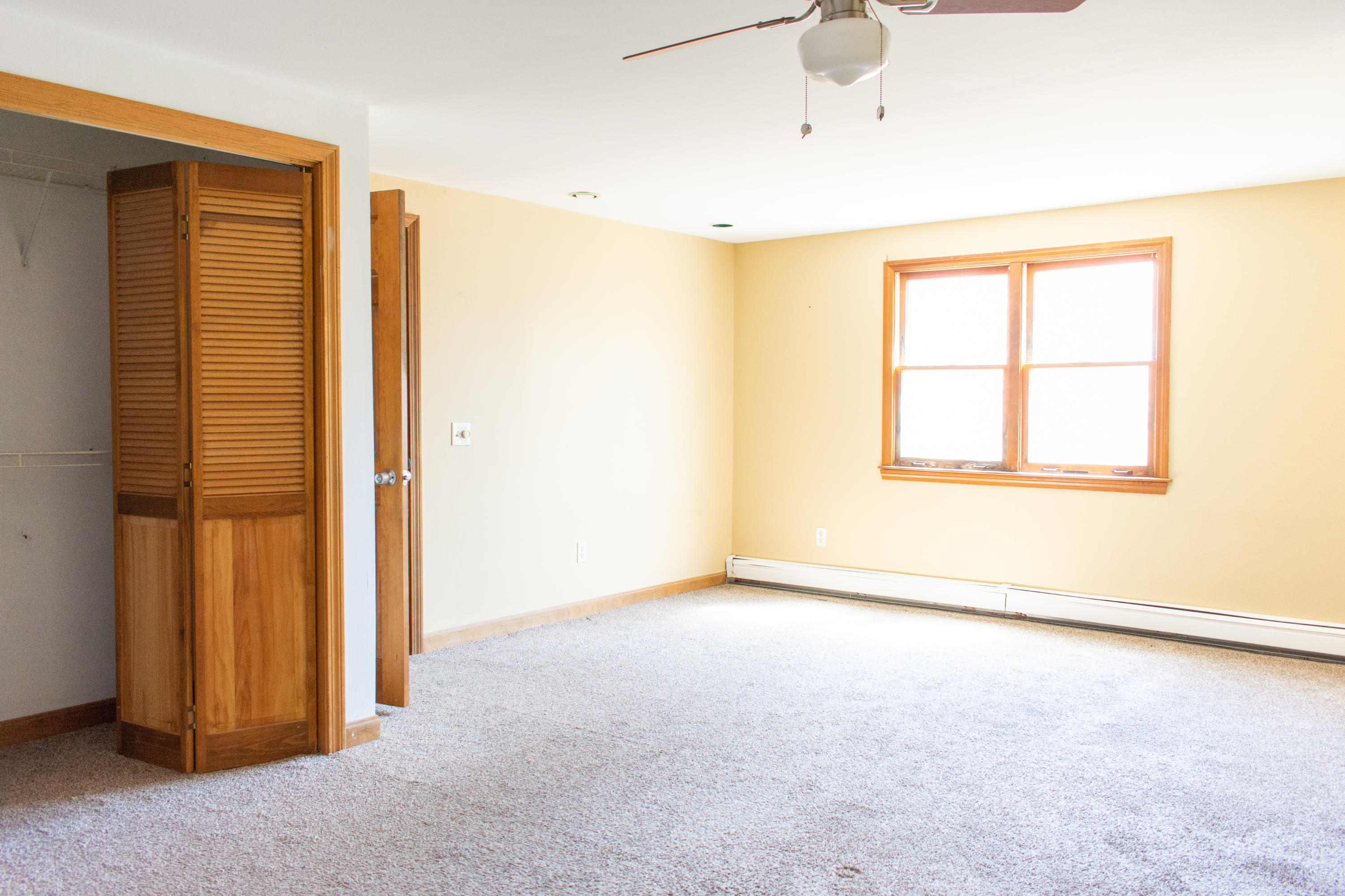 398 Lincoln Rd Extension Hyannis, MA 02601 - Photo 13 of 26 an empty room with windows