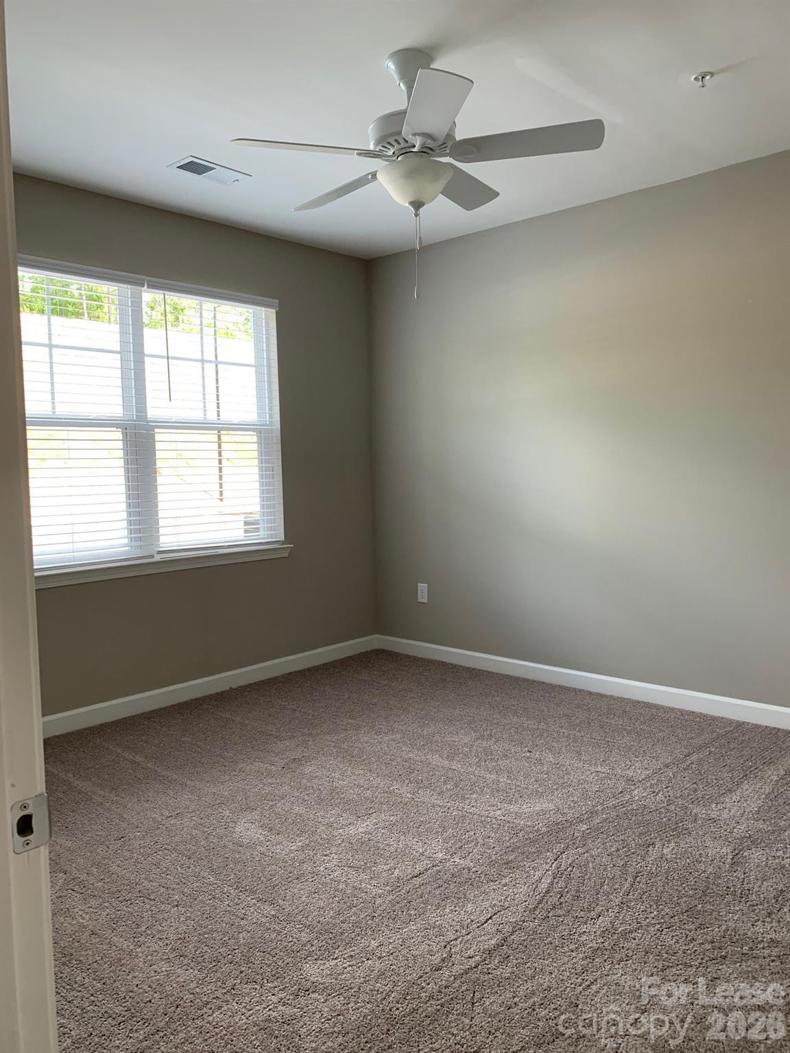 50 Riverside Drive Hickory, NC 28601 - Photo 7 of 16 an empty room with a window