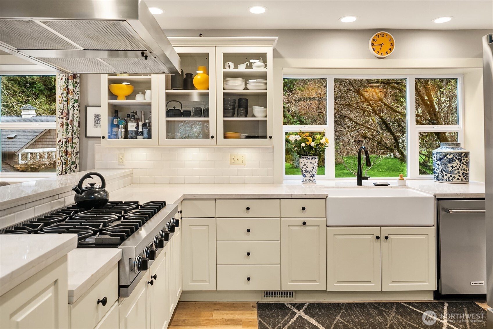 16524 Mink Road Northeast Woodinville, WA 98077 - Photo 17 of 40 a kitchen with stainless steel appliances granite countertop a stove and a window