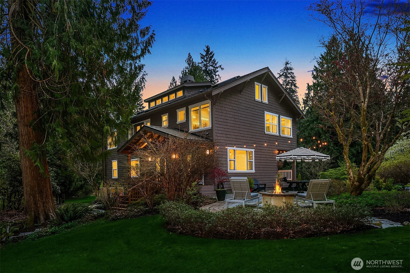 16524 Mink Road Northeast Woodinville, WA 98077 - Photo 32 of 40 a front view of a house with a yard and green space