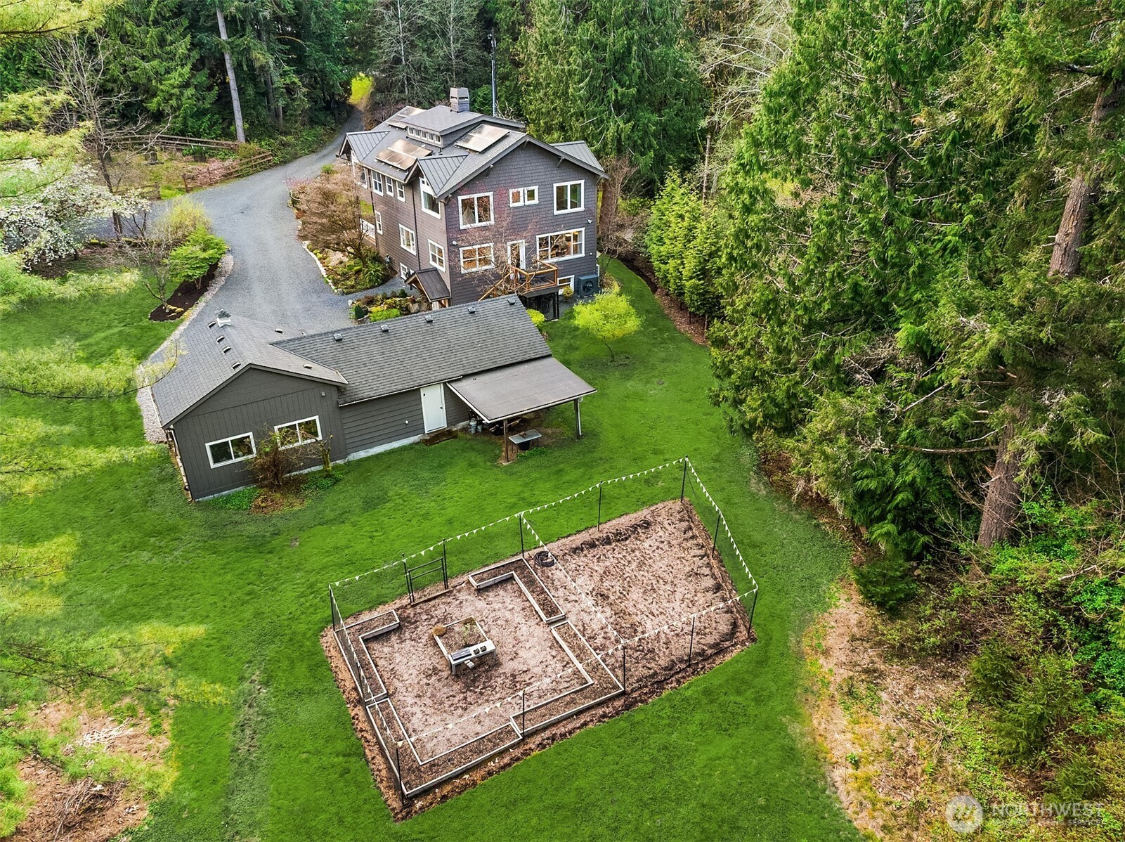 16524 Mink Road Northeast Woodinville, WA 98077 - Photo 38 of 40 an aerial view of a house with a yard