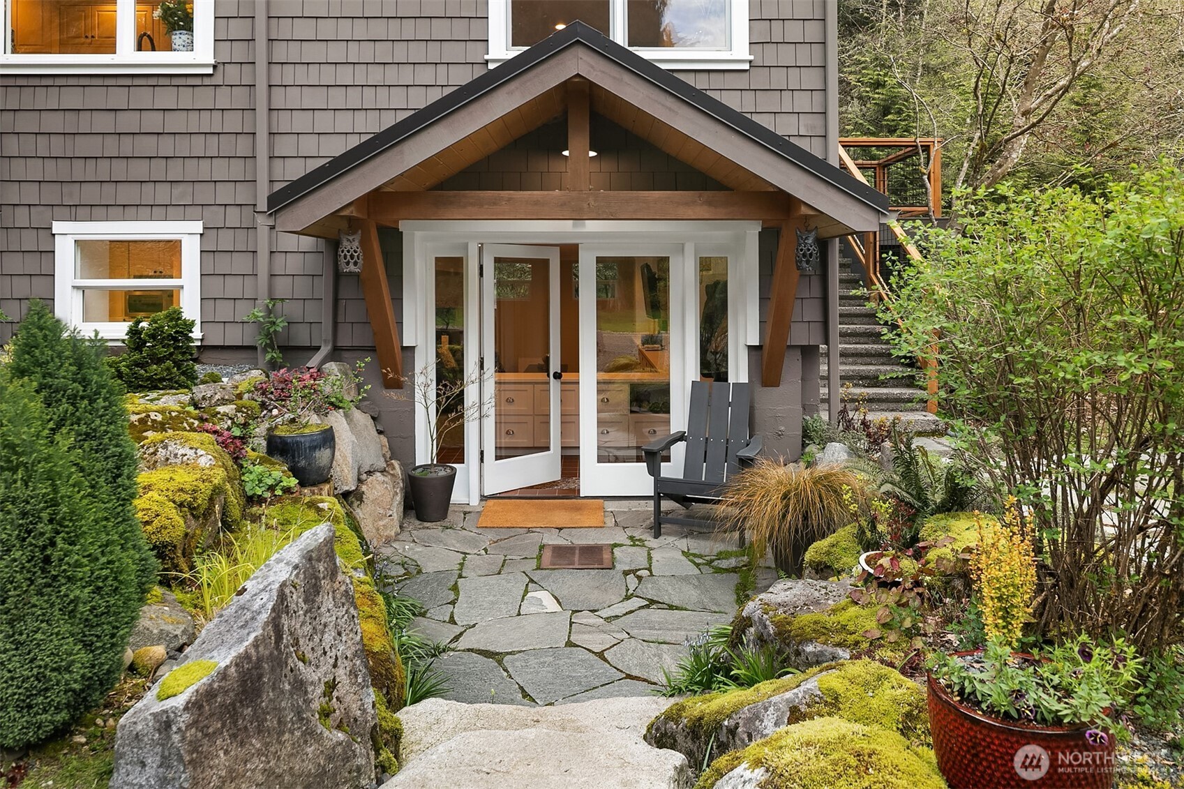 16524 Mink Road Northeast Woodinville, WA 98077 - Photo 8 of 40 a front view of a house with a yard