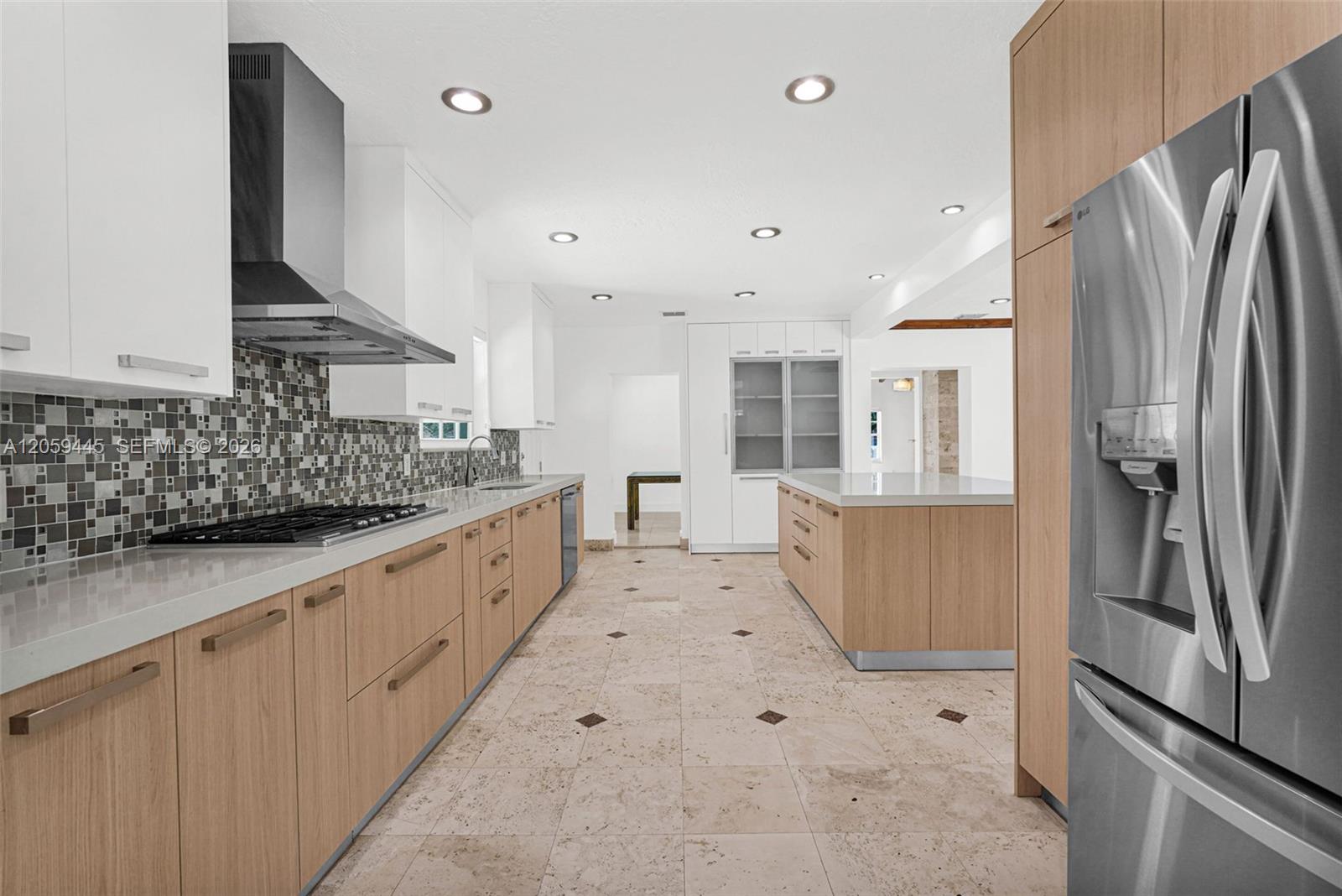 244 Southwest 28th Road Miami, FL 33129 - Photo 35 of 70 Chefs Dream Custom Kitchen | SS Appliances, Gas Cooktop, Breakfast Nook, Wine Cooler