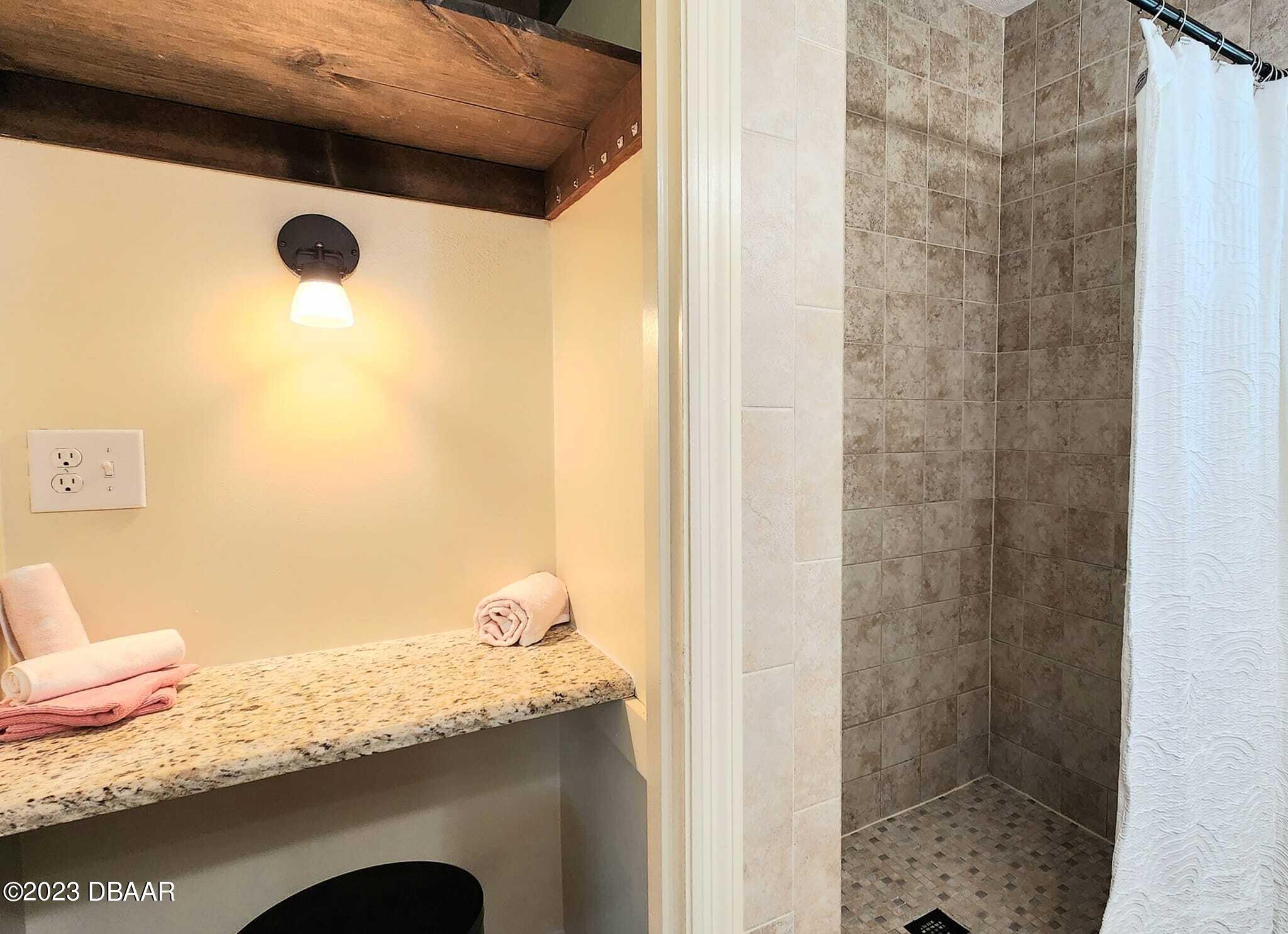 1519 North Beach Street Ormond Beach, FL 32174 - Photo 28 of 92 vanity in the ensuite