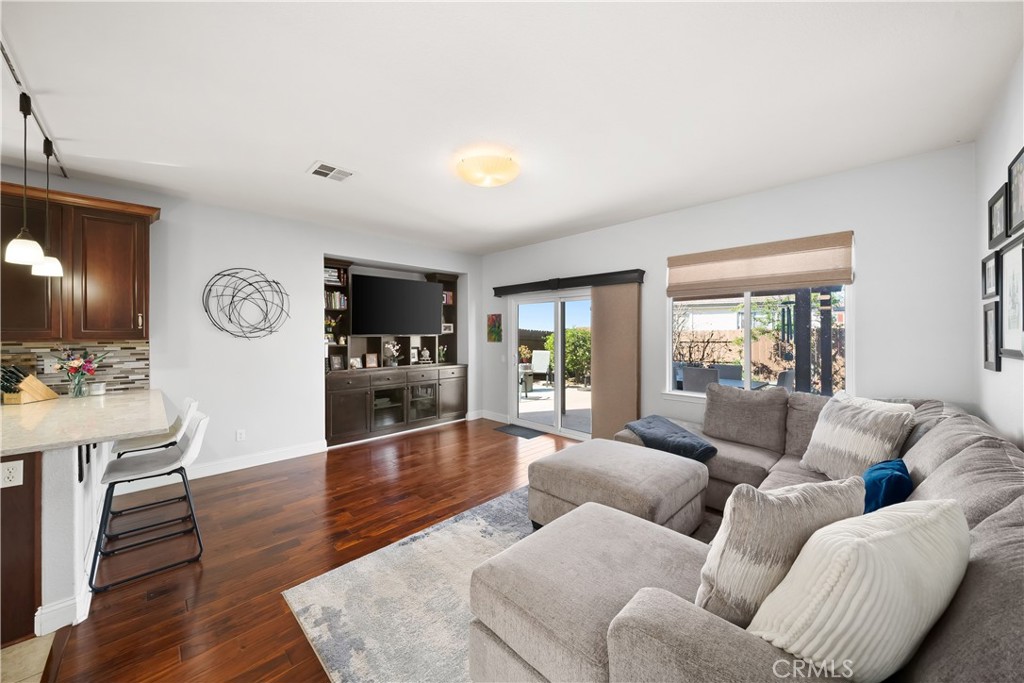 731 Voyager Road Lompoc, CA 93436 - Photo 12 of 57 a living room with furniture and wooden floor