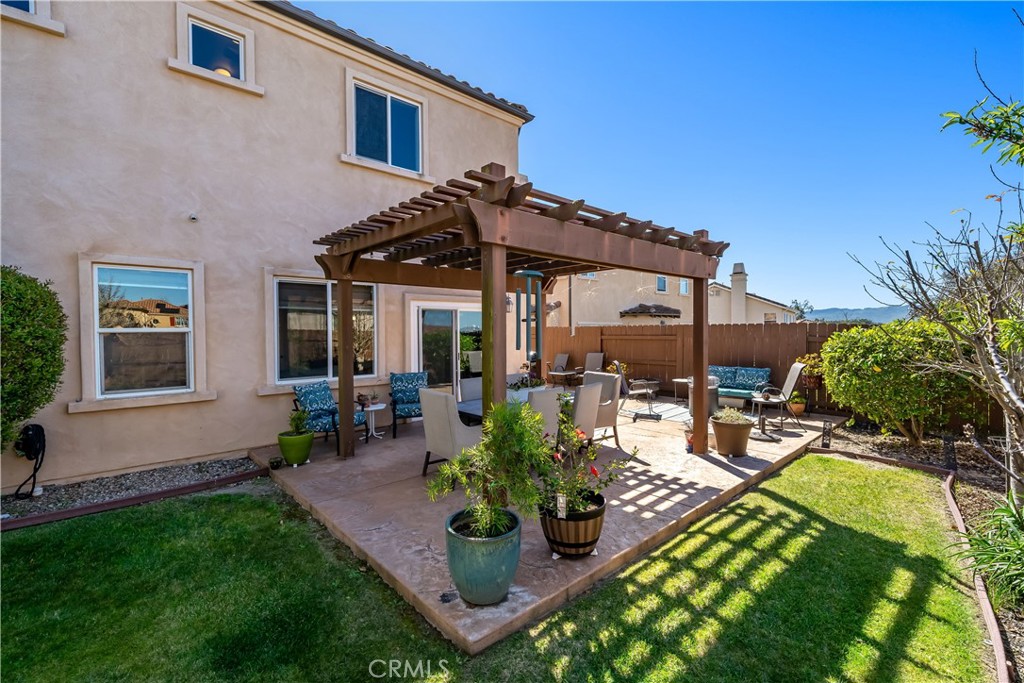 731 Voyager Road Lompoc, CA 93436 - Photo 18 of 57 a view of a house with backyard and sitting area