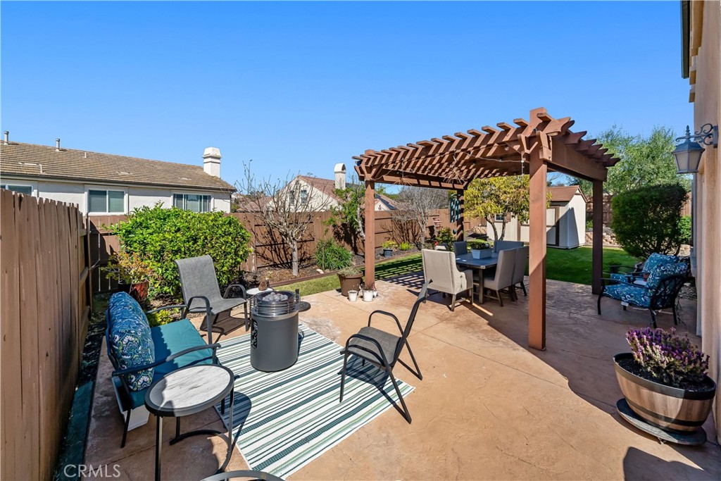 731 Voyager Road Lompoc, CA 93436 - Photo 19 of 57 a view of a chairs and tables in patio