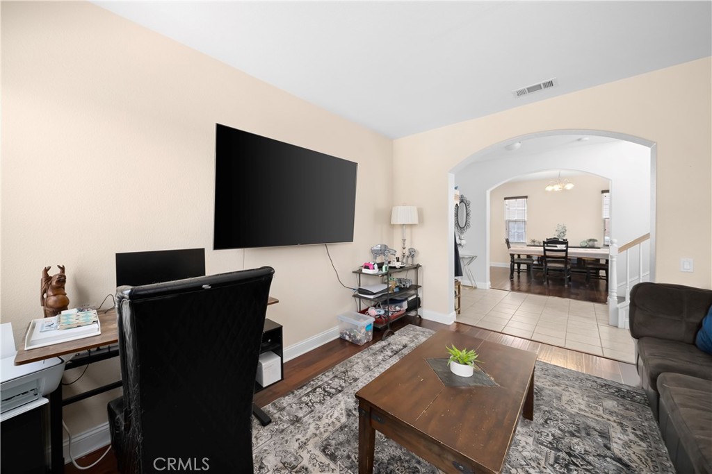 731 Voyager Road Lompoc, CA 93436 - Photo 21 of 57 a living room with furniture and a flat screen tv