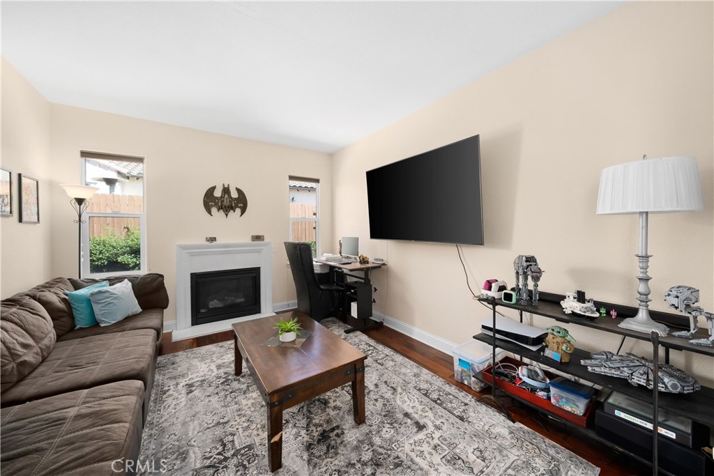 731 Voyager Road Lompoc, CA 93436 - Photo 22 of 57 a living room with furniture and a flat screen tv