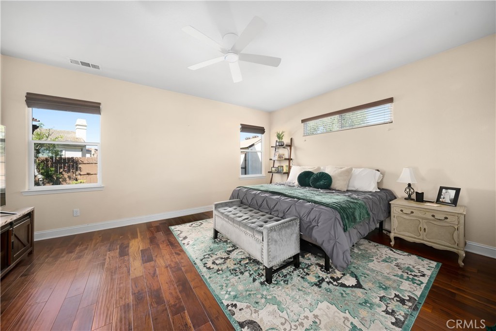 731 Voyager Road Lompoc, CA 93436 - Photo 24 of 57 a bedroom with a bed and wooden floor