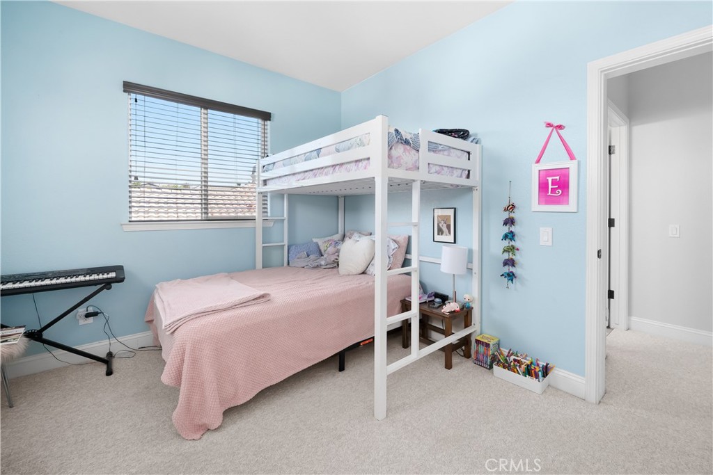 731 Voyager Road Lompoc, CA 93436 - Photo 31 of 57 a bedroom with a bed and a window