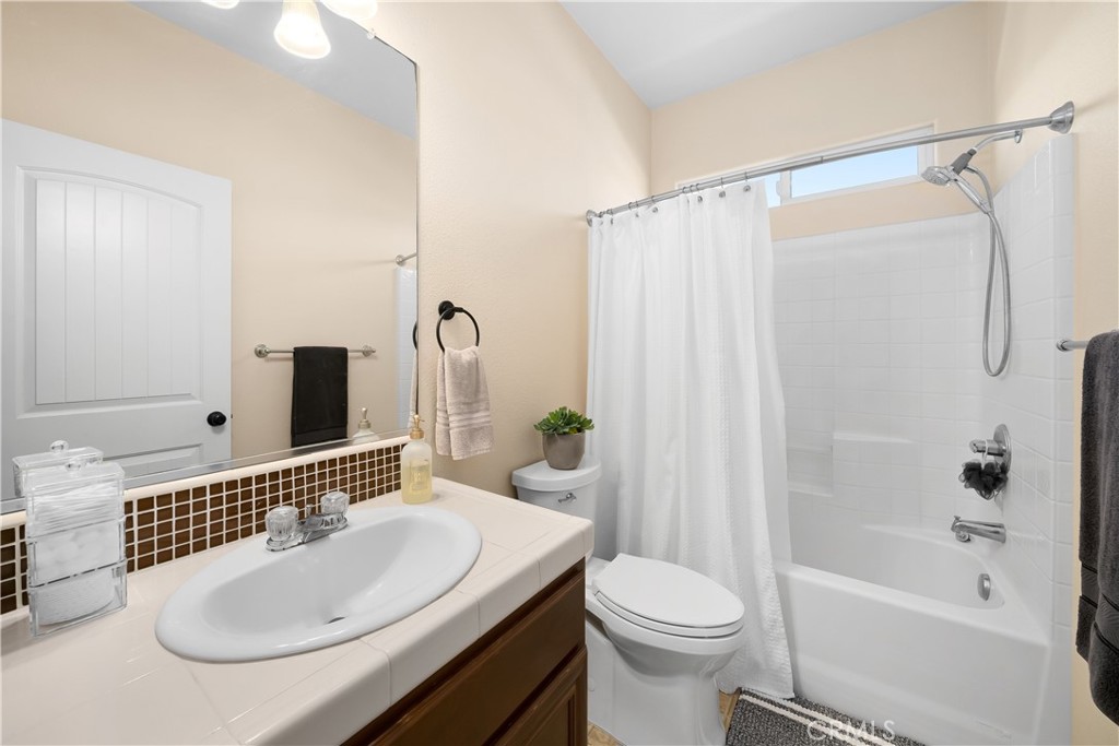 731 Voyager Road Lompoc, CA 93436 - Photo 33 of 57 a bathroom with a sink toilet and shower