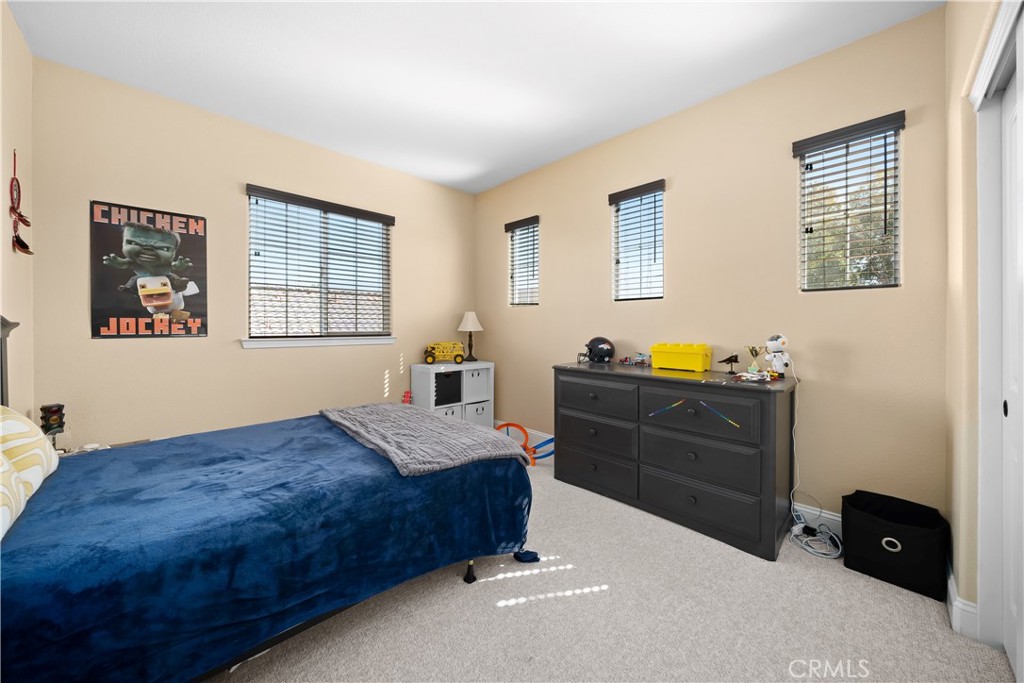 731 Voyager Road Lompoc, CA 93436 - Photo 34 of 57 a bedroom with a bed and windows