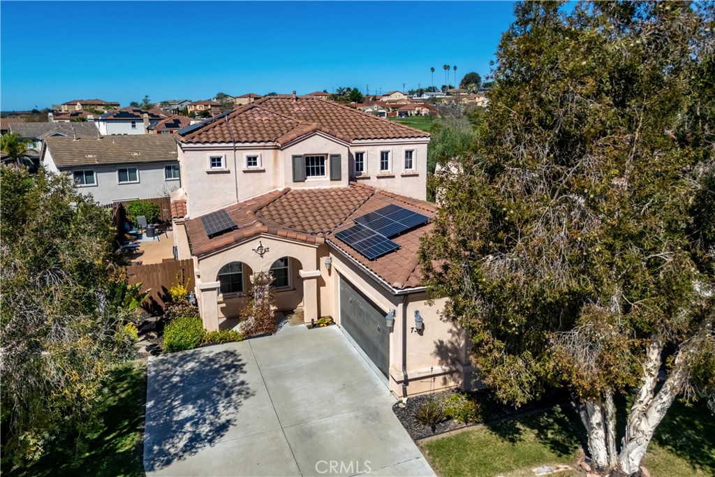 731 Voyager Road Lompoc, CA 93436 - Photo 42 of 57 a front view of a house with a yard
