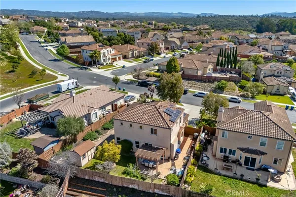 an aerial view of a house with a garden