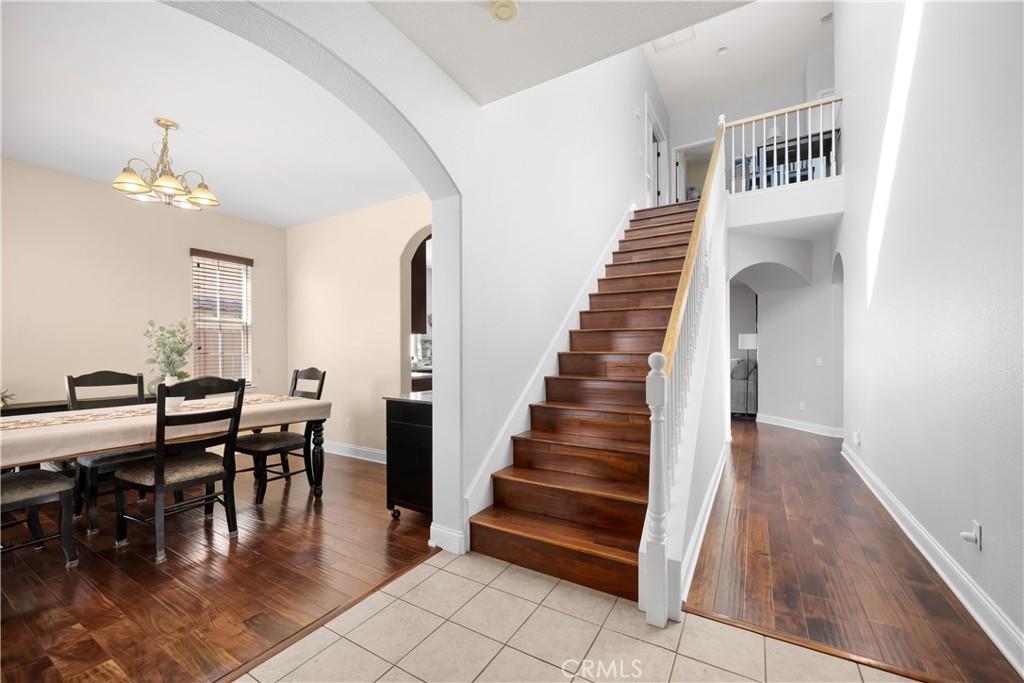 731 Voyager Road Lompoc, CA 93436 - Photo 7 of 57 a view of a dining room with furniture and wooden floor
