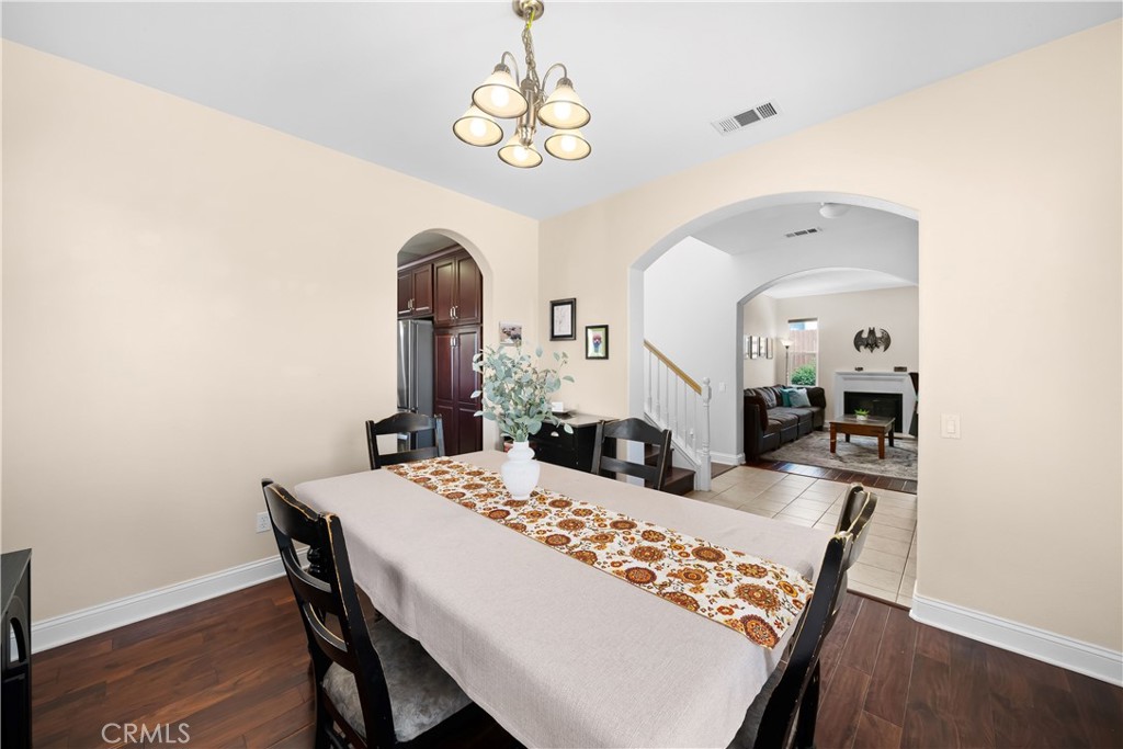 731 Voyager Road Lompoc, CA 93436 - Photo 8 of 57 a view of a dining room with furniture and wooden floor