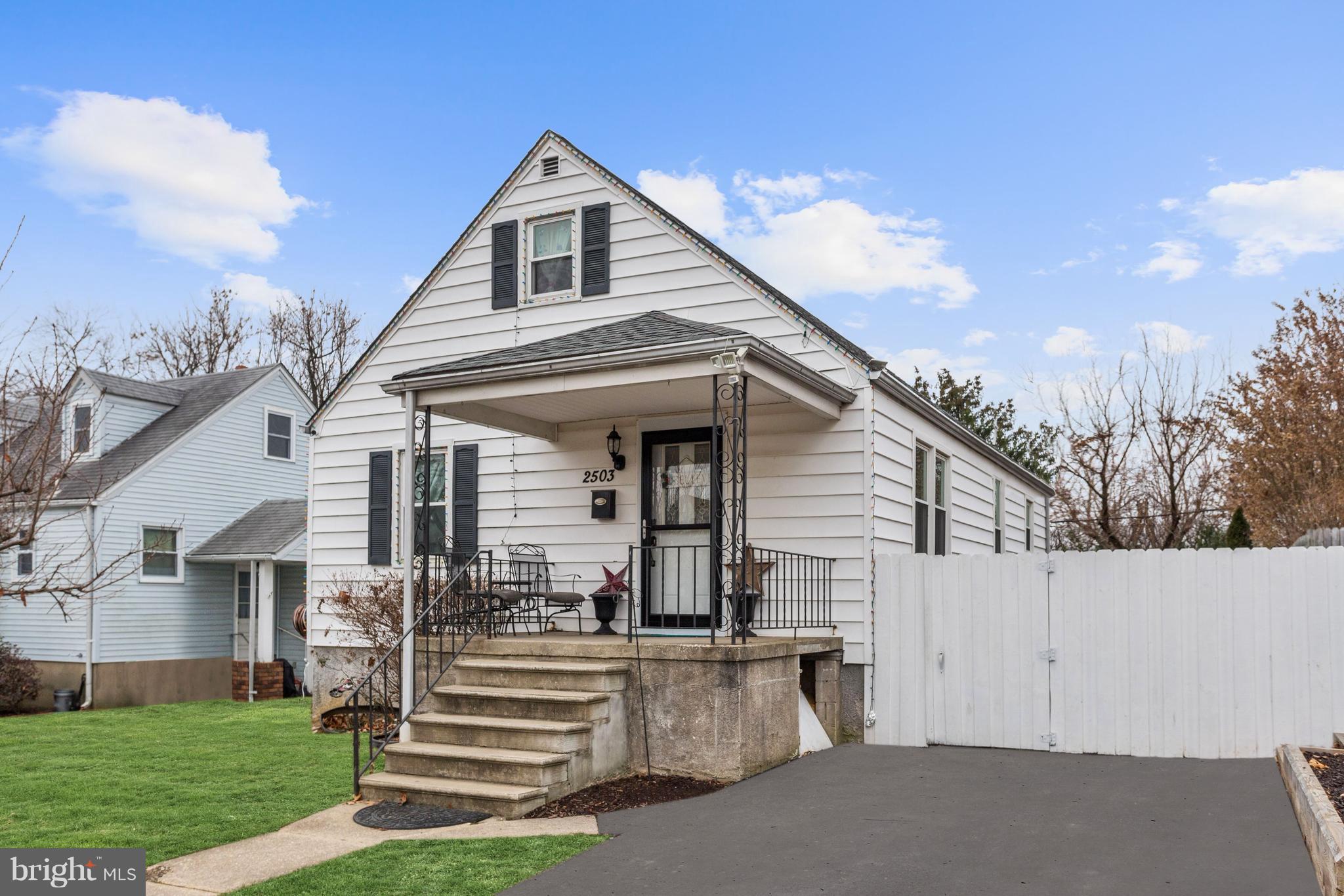 2503 Wendover Road Baltimore, MD 21234 - Photo 1 of 22 a view of a house with a yard