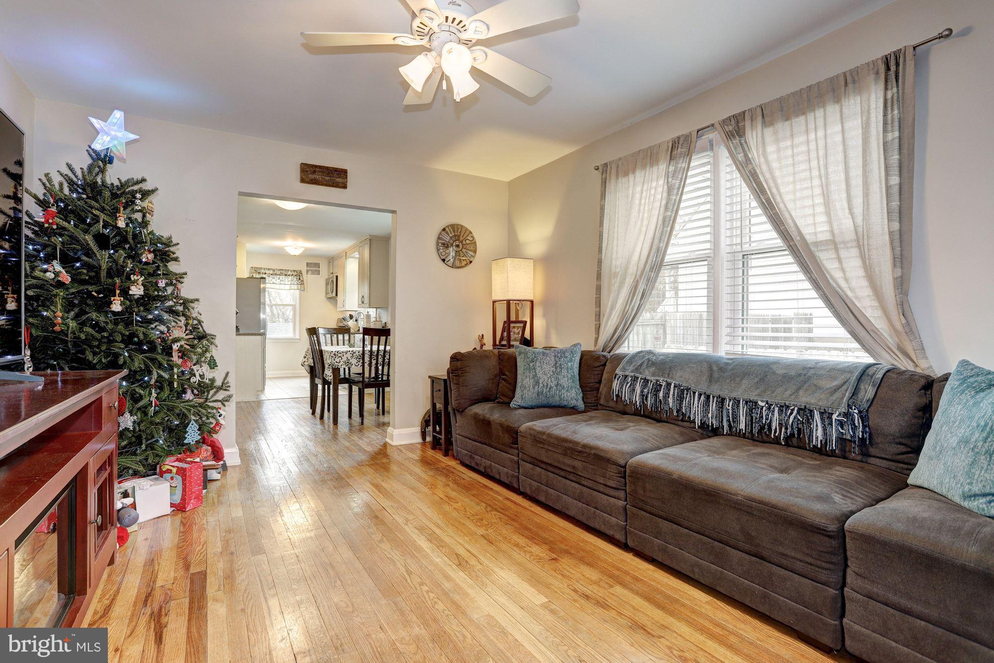 2503 Wendover Road Baltimore, MD 21234 - Photo 2 of 22 a living room with furniture and a large window