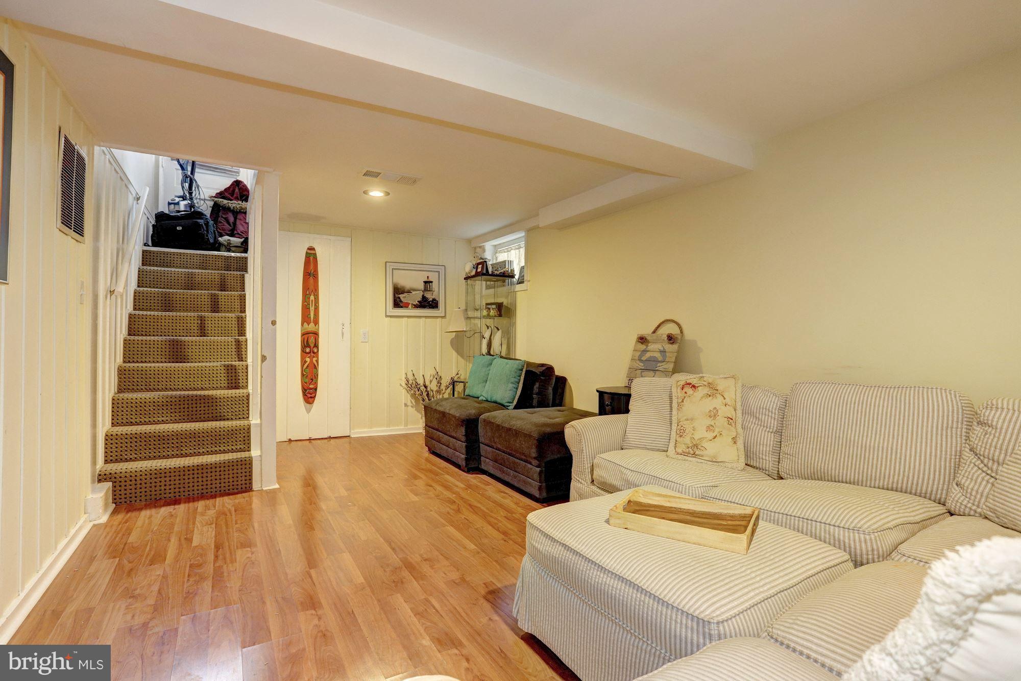2503 Wendover Road Baltimore, MD 21234 - Photo 17 of 22 a living room with furniture and wooden floor