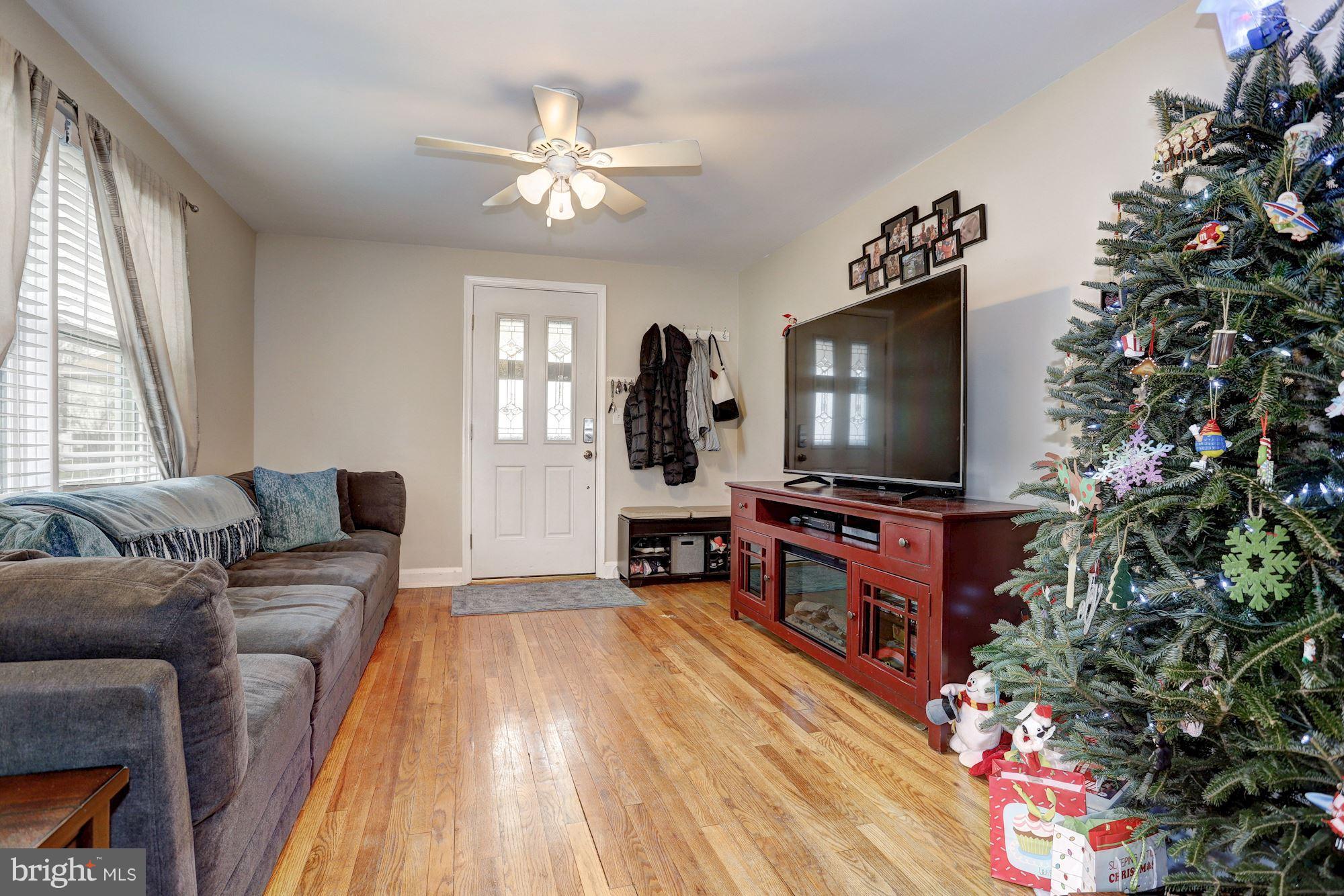 2503 Wendover Road Baltimore, MD 21234 - Photo 3 of 22 a living room with furniture and a flat screen tv