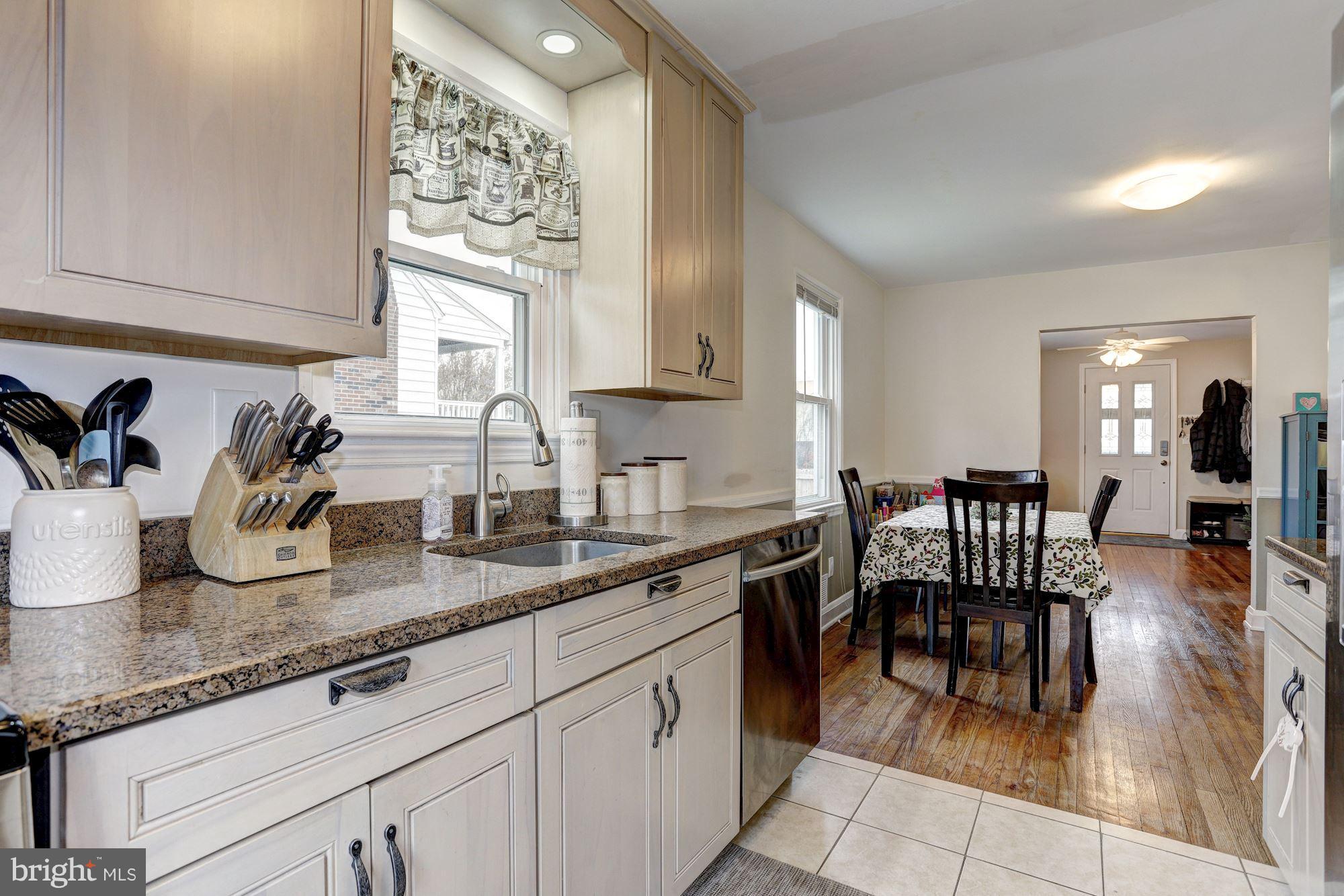 2503 Wendover Road Baltimore, MD 21234 - Photo 8 of 22 a kitchen with sink and view of living room