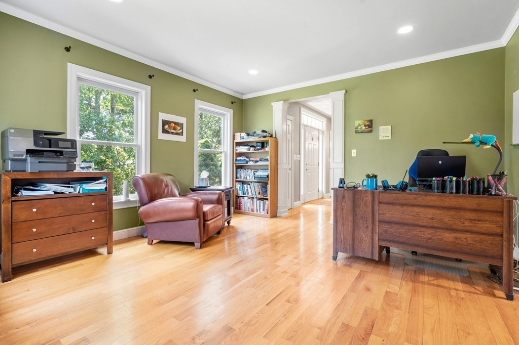 24 Whitney Road Boxford, MA 01921 - Photo 23 of 42 a living room with furniture and a dresser