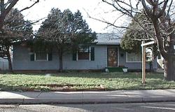 4320 Gables Street Amarillo, TX 79110 - Photo 1 of 1 a front view of a house with a garden