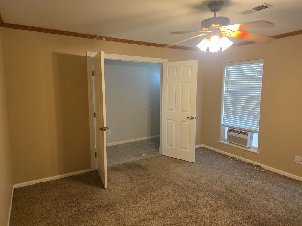 13600 Farm To Market Road 1314 Conroe, TX 77302 - Photo 18 of 26 a view of an empty room with a window