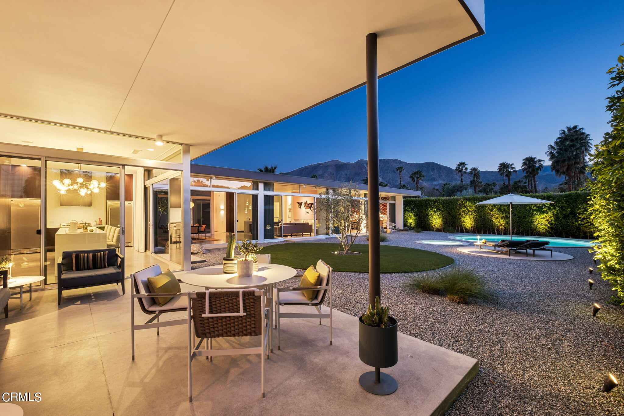 71466 San Gorgonio Road Rancho Mirage, CA 92270 - Photo 1 of 31 a view of a patio with a table and chairs