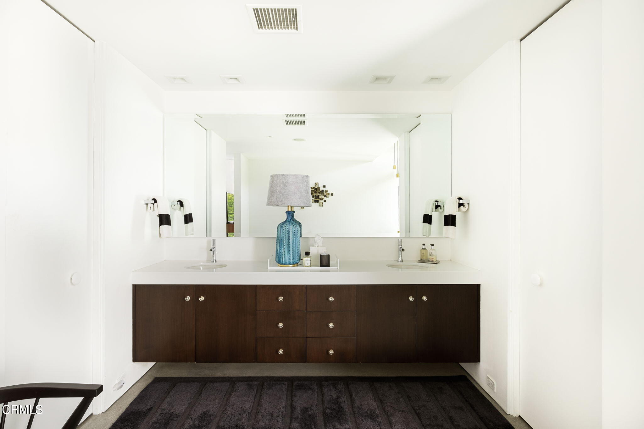 71466 San Gorgonio Road Rancho Mirage, CA 92270 - Photo 17 of 31 a bathroom with a sink vanity granite and a mirror